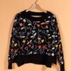 Jersey sostenible de lana negro con flores