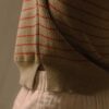 Detalle bajo jersey sin mangas Latte