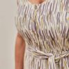 Detalle estampado selva beige mono lino largo