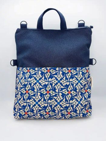 Bolso-mochila azul con bolsillo modernista
