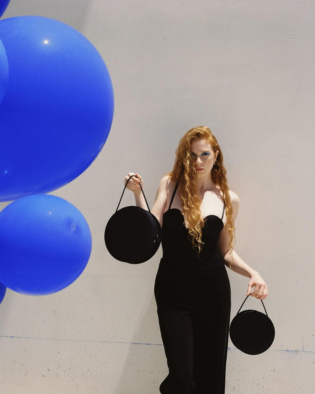 Bolso redondo de cuero reciclado - Imagen 7