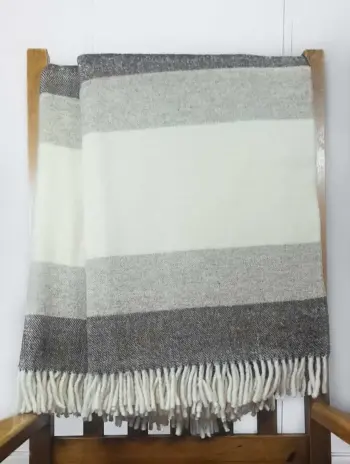Manta de tres colores para sofá 100% lana