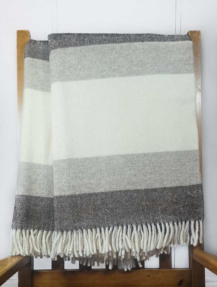 Manta de tres colores para sofá 100% lana