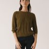 Jersey calado verde de algodón orgánico con textura vertical y cuello redondo para mujer