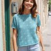 Jersey de punto calado con topos y manga corta en algodón reciclado para mujer