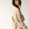 Cárdigan largo beige de lana merino