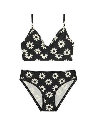 Conjunto de bralette y braga negros con estampado de flores blancas